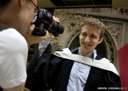 Silver medallist Leonid Kelner gets his photo taken in advance of his convocation ceremony next week. Kelner had an almost perfect GPA of 4.29. 